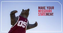 Make your Missouri Statement: Bear statue wearing athletic jersey